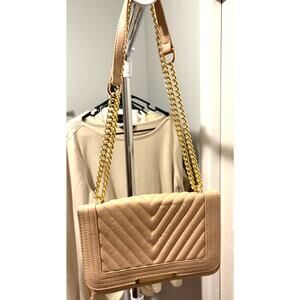 Lola Mae handbag, tan in color, with gold strap, can also be used as a crossbody